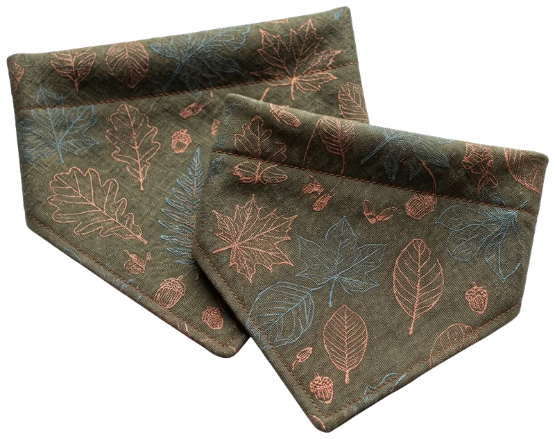 Two olive leaf-print slip-on over-the-collar dog bandanas with stitched collar channel